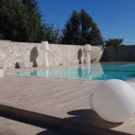 rivestimento parete bordo piscina travertino foro aperto 1